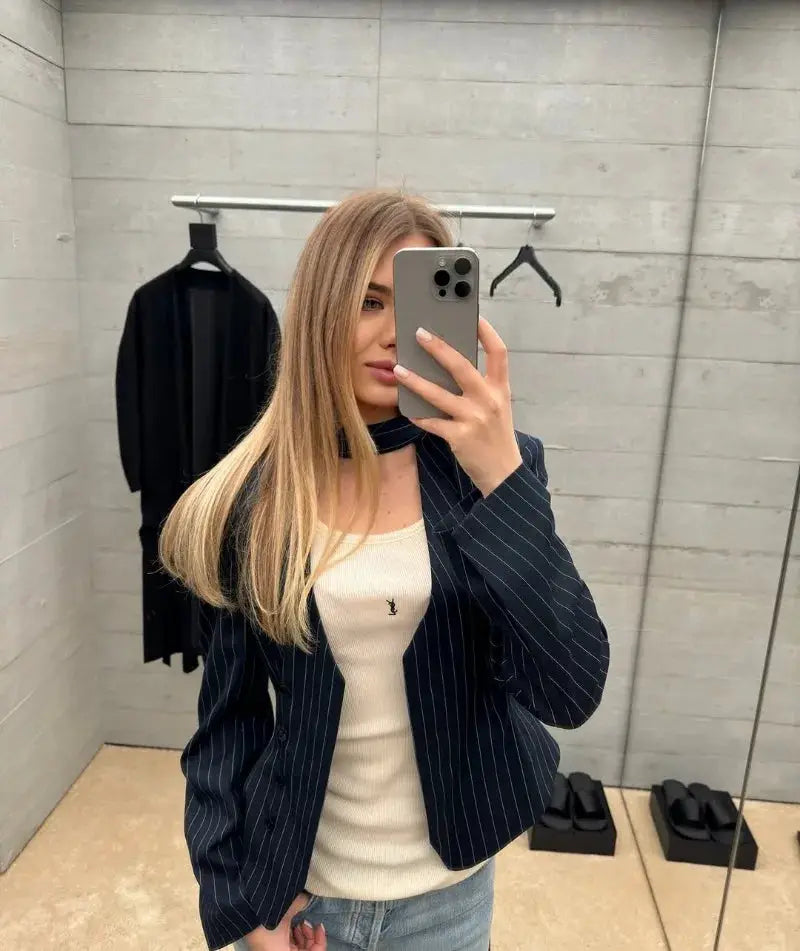 Trendix Elegant navy pinstripe blazer, part of a Simples Market 2-piece set, worn over a white top.