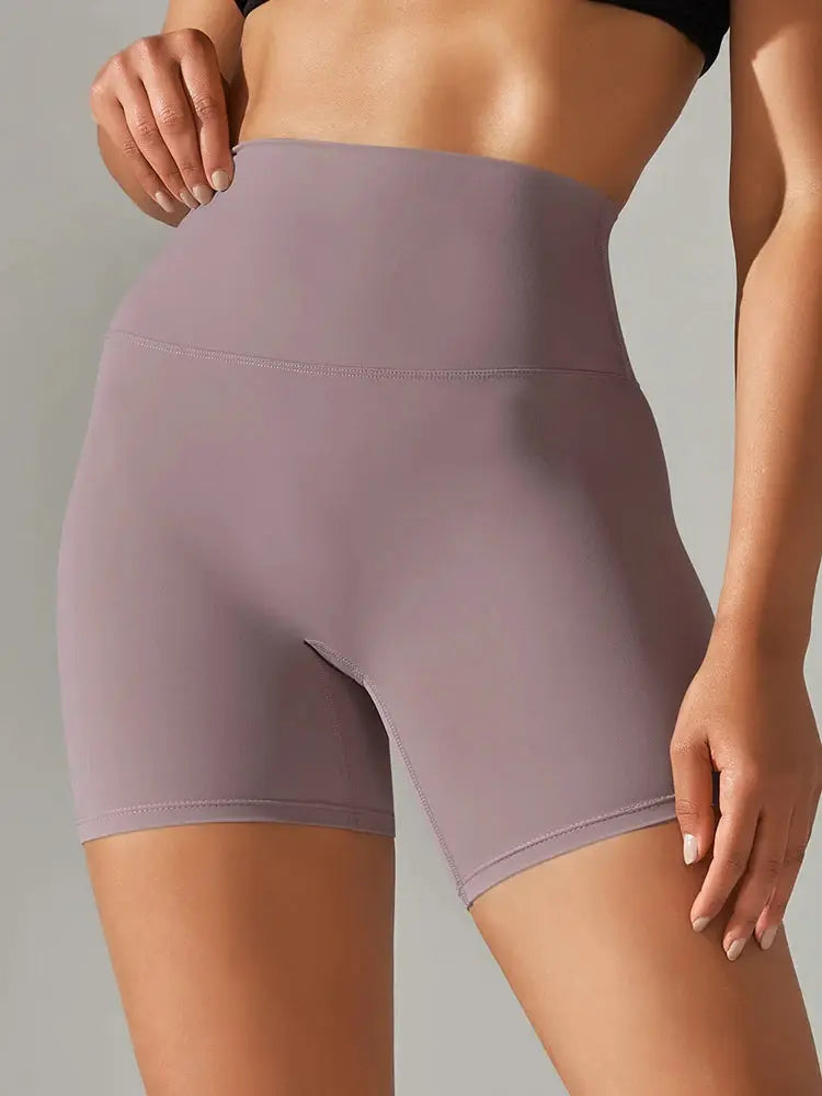 Women's high-waist mauve yoga shorts from Simples Market, squat-proof and quick-dry for workouts.