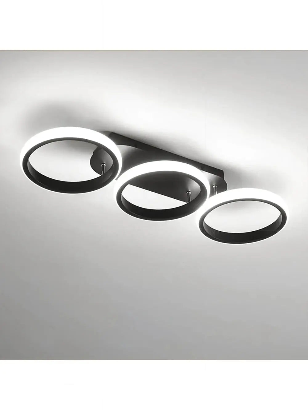 LED ceiling light with three circular rings on a black bar; modern luminaire for hallway, bedroom, or living area.