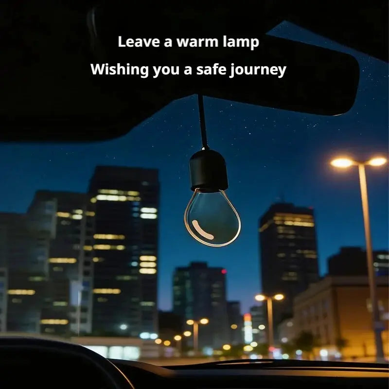 Car interior hanging LED bulb ornament with clear glass bulb and black cap