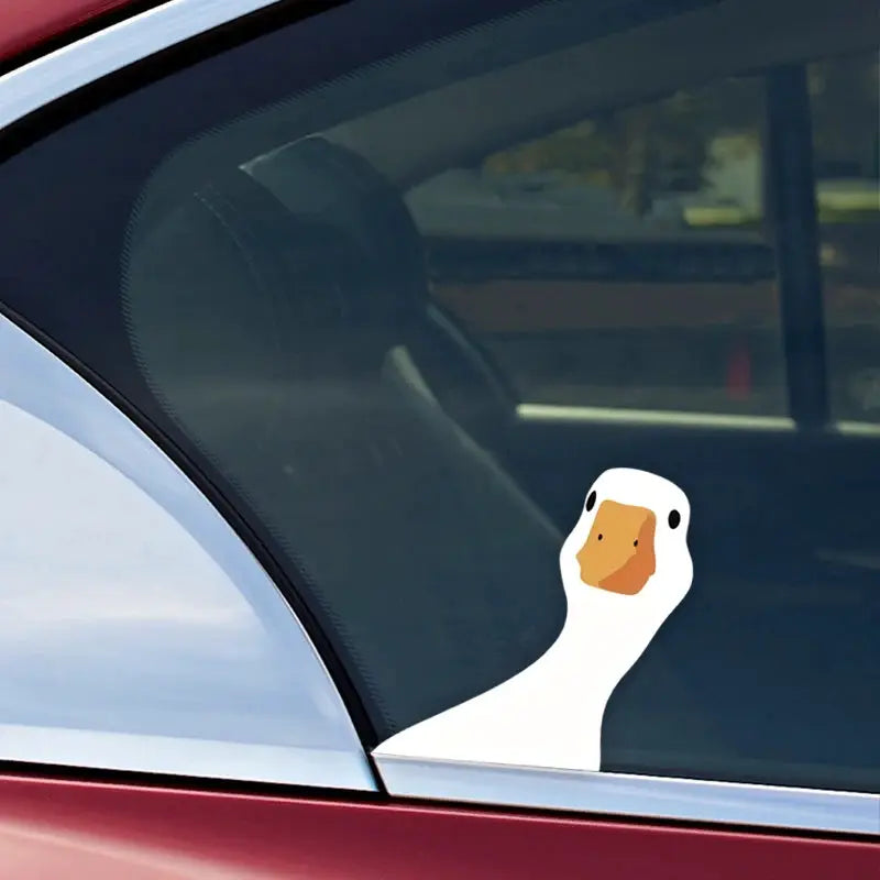 Weatherproof vinyl duck decal for car window by Simples Market; white duck with orange beak.