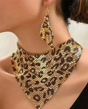 Leopard-print jewelry set with a gold-tone bib necklace and matching dangle earrings.