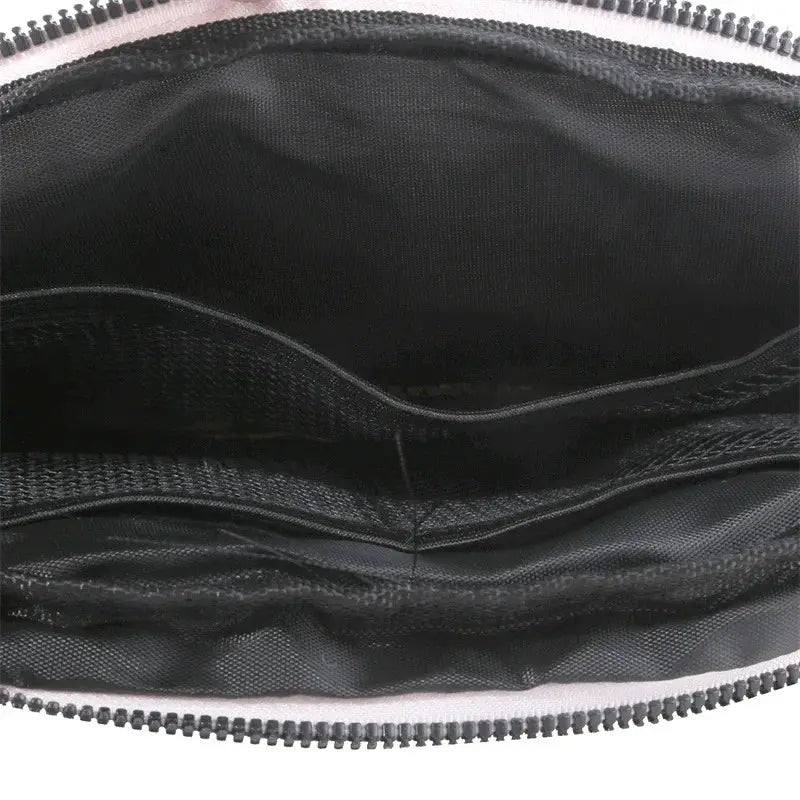 Women's black waist bag with zipper closure and interior pockets