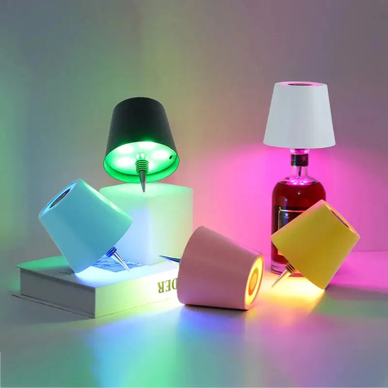 Wireless LED bottle lights for wine bottles; touch-controlled, color-changing RGB lamps in assorted colors.