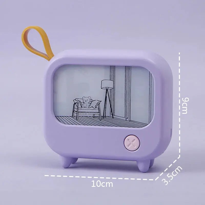 TV painting night light LED by Simples Market, lavender plastic mini desk lamp with yellow loop.