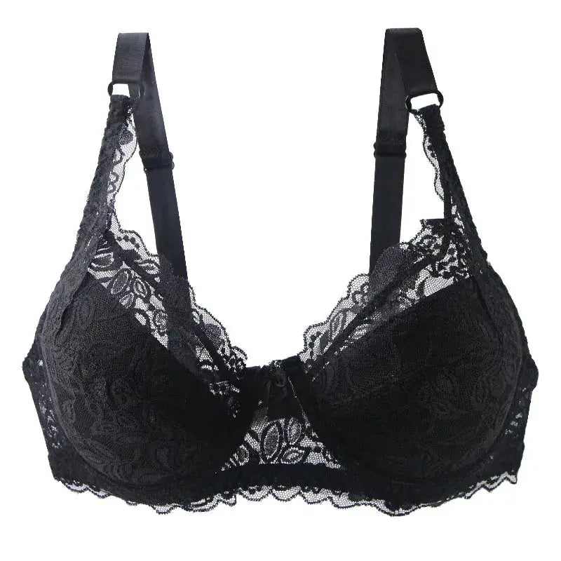 Lace push-up bra in black with scalloped edges and adjustable straps