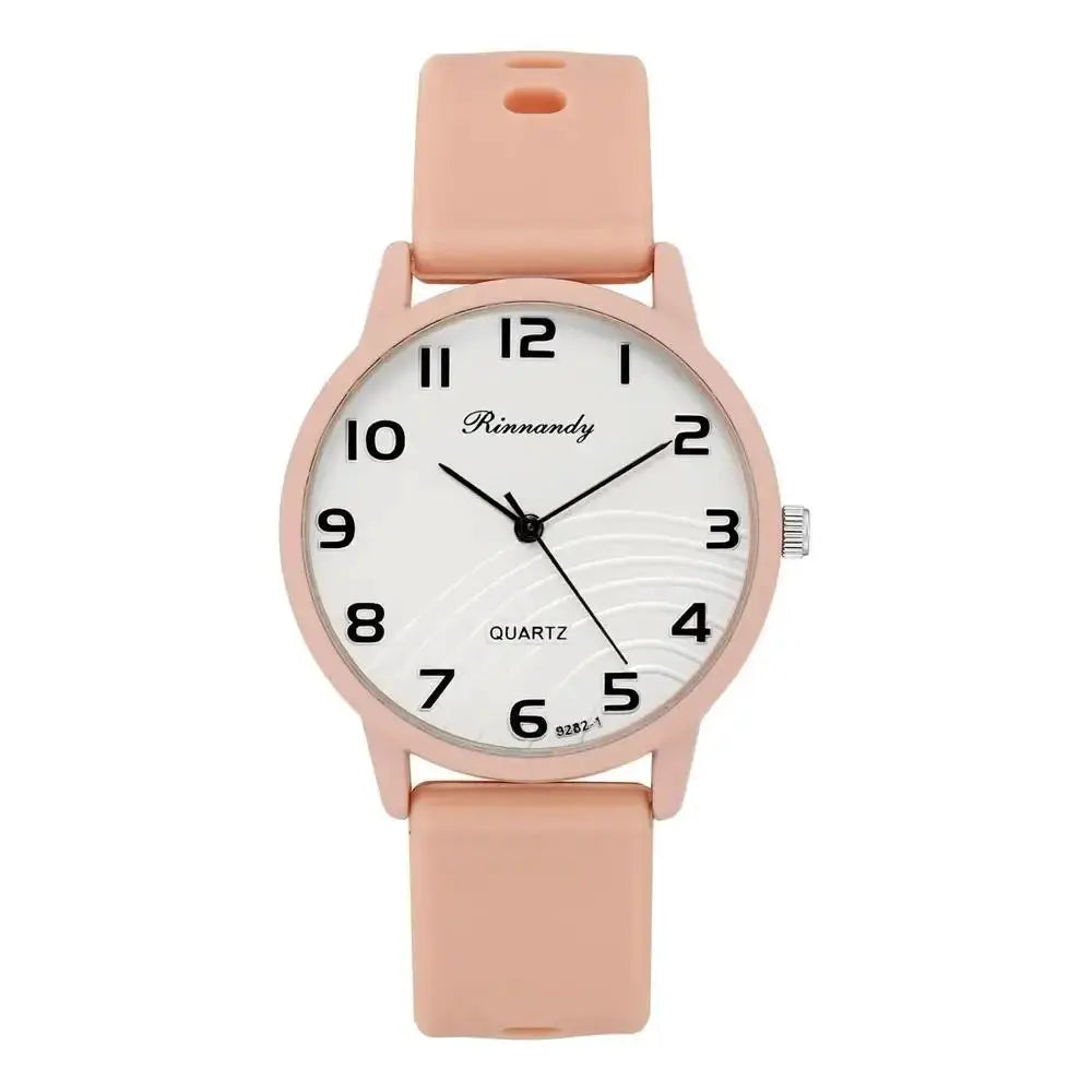 Rinnandy women’s quartz watch with pink silicone band and white Arabic-dial face