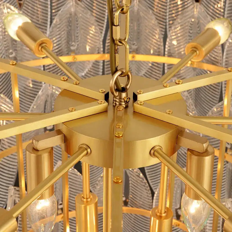 Gold chandelier pendant lamp by Simples Market with exposed bulbs and chain
