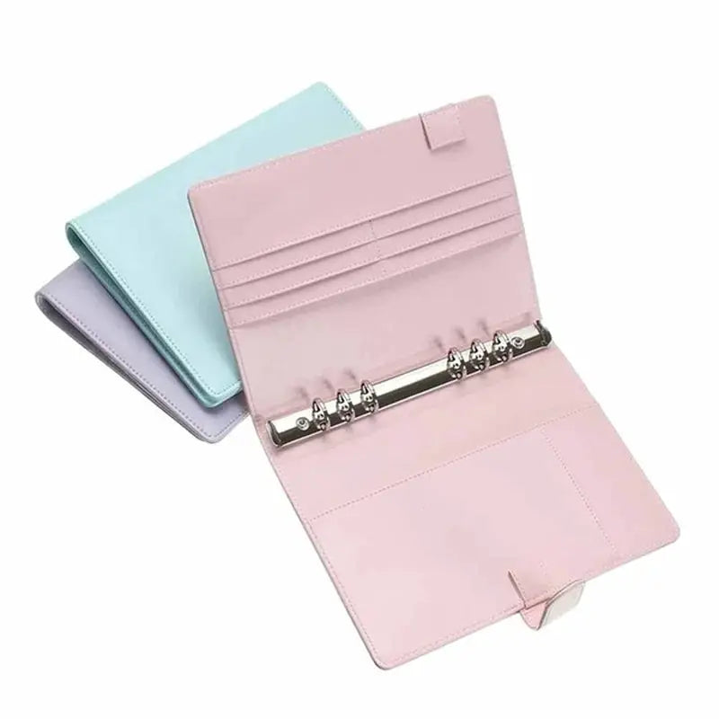 Simples Market three pastel leather ring binder notebook covers in pink, mint and lavender with six rings.