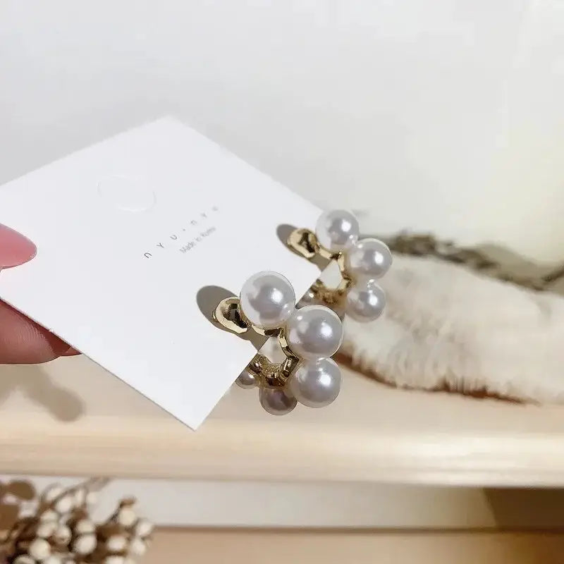 Pair of gold-tone imitation pearl C-shape drop earrings with clustered white pearls