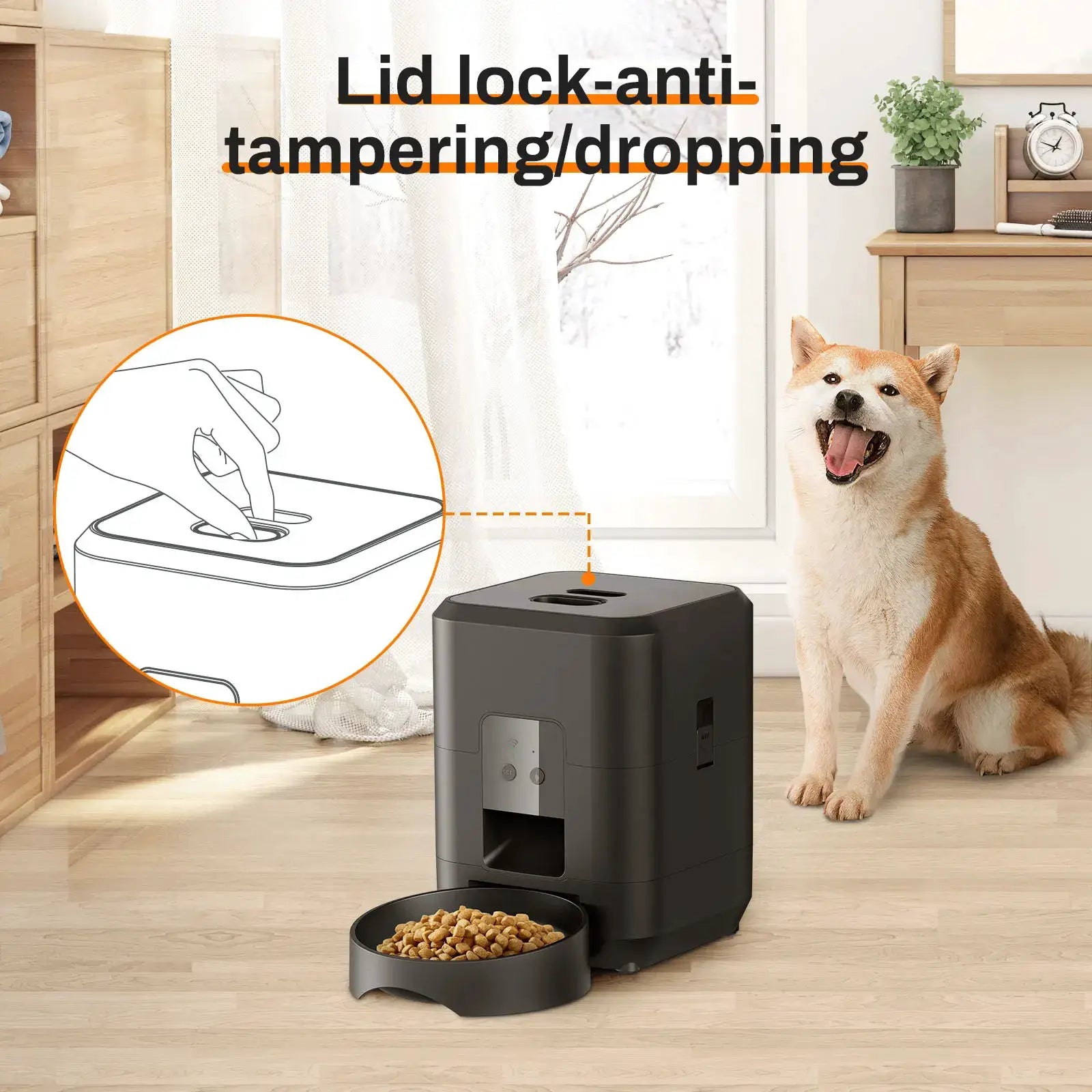 Smart automatic pet feeder with black body and separate kibble bowl for cats and dogs