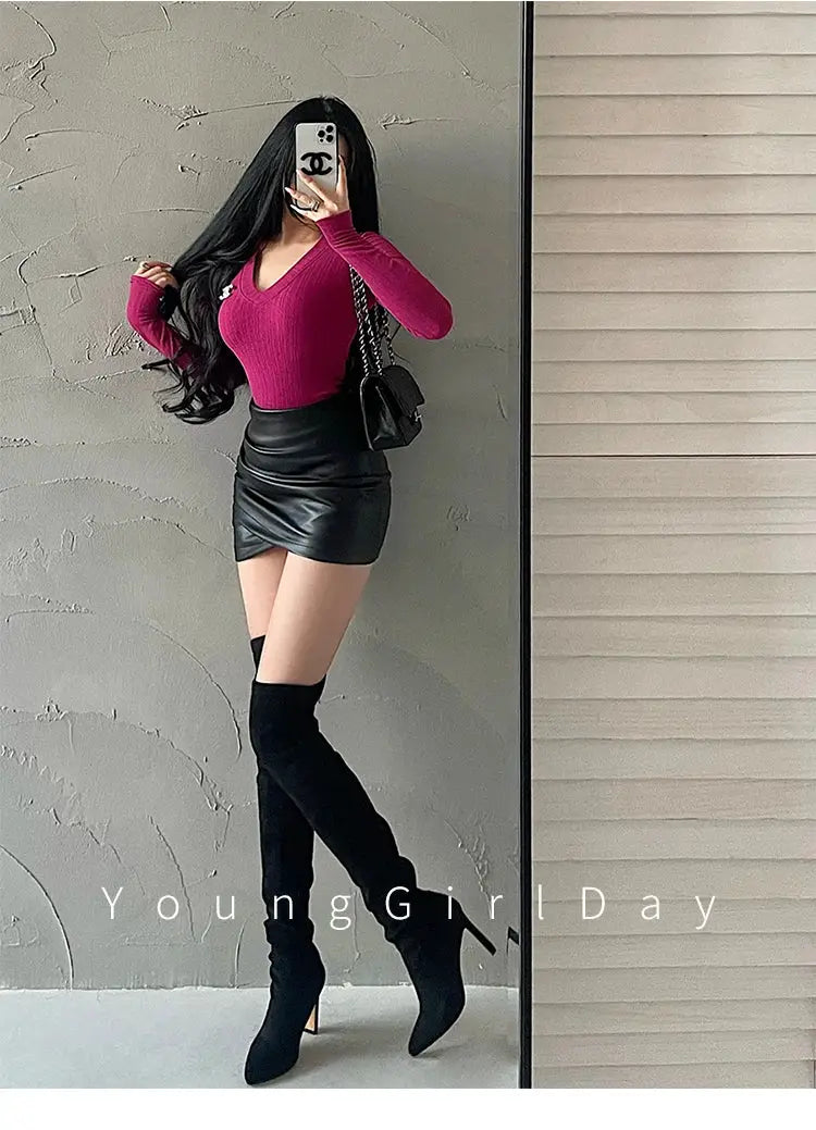 WOMENGAGA PU leather high-waisted mini skirt in black