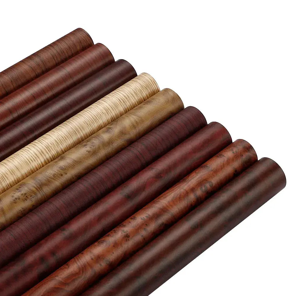 Wood grain PVC vinyl wrap rolls in assorted brown tones by Simples Market for car interiors and furniture DIY