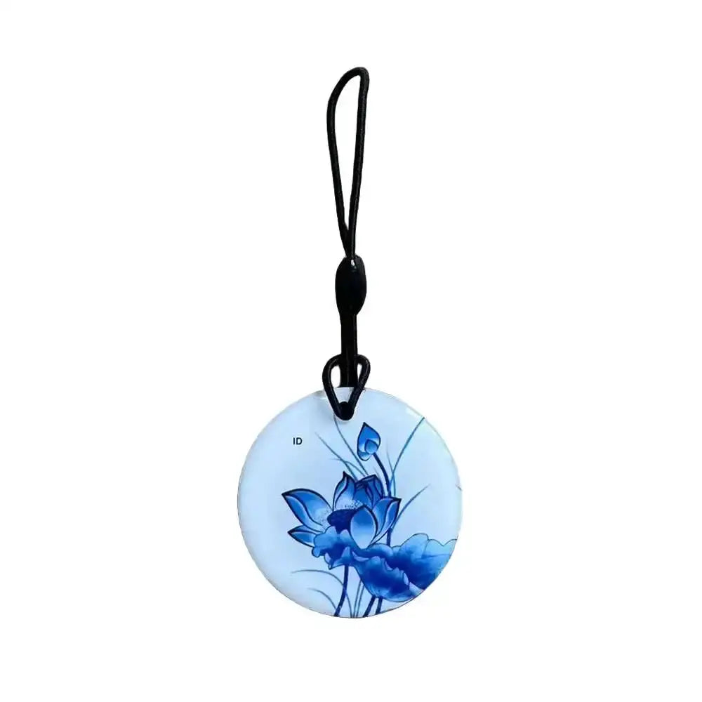RFID key tag, circular 125KHz EM4305/T5577 blank writable ID tag with blue floral design and black lanyard