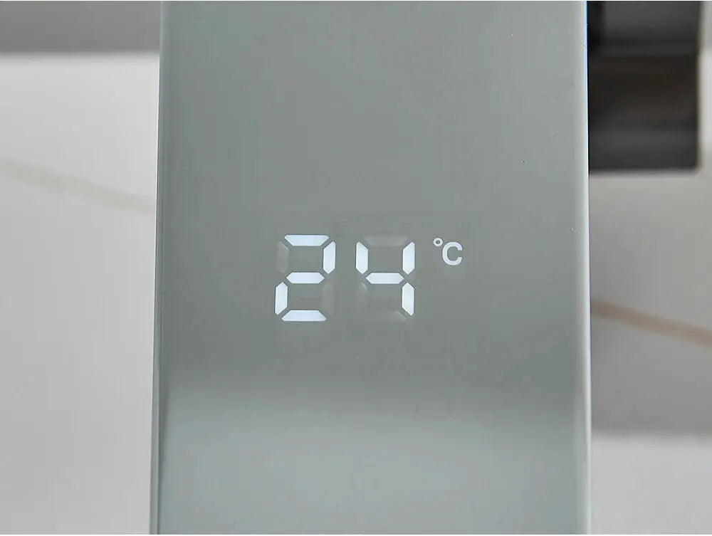 White smart sensor basin faucet with digital temperature display showing 25°C