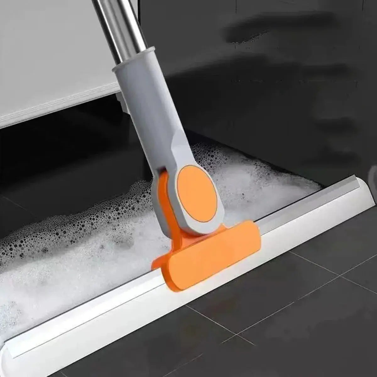 Simples Market silicone scraper broom with orange accents on a metal handle for glass and floor cleaning