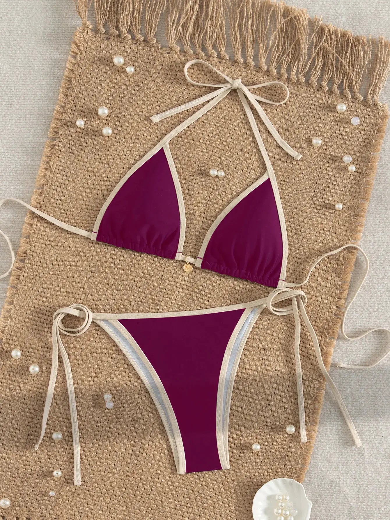 Purple color-block bikini set by Simples Market with white trim, adjustable ties and cross-back top