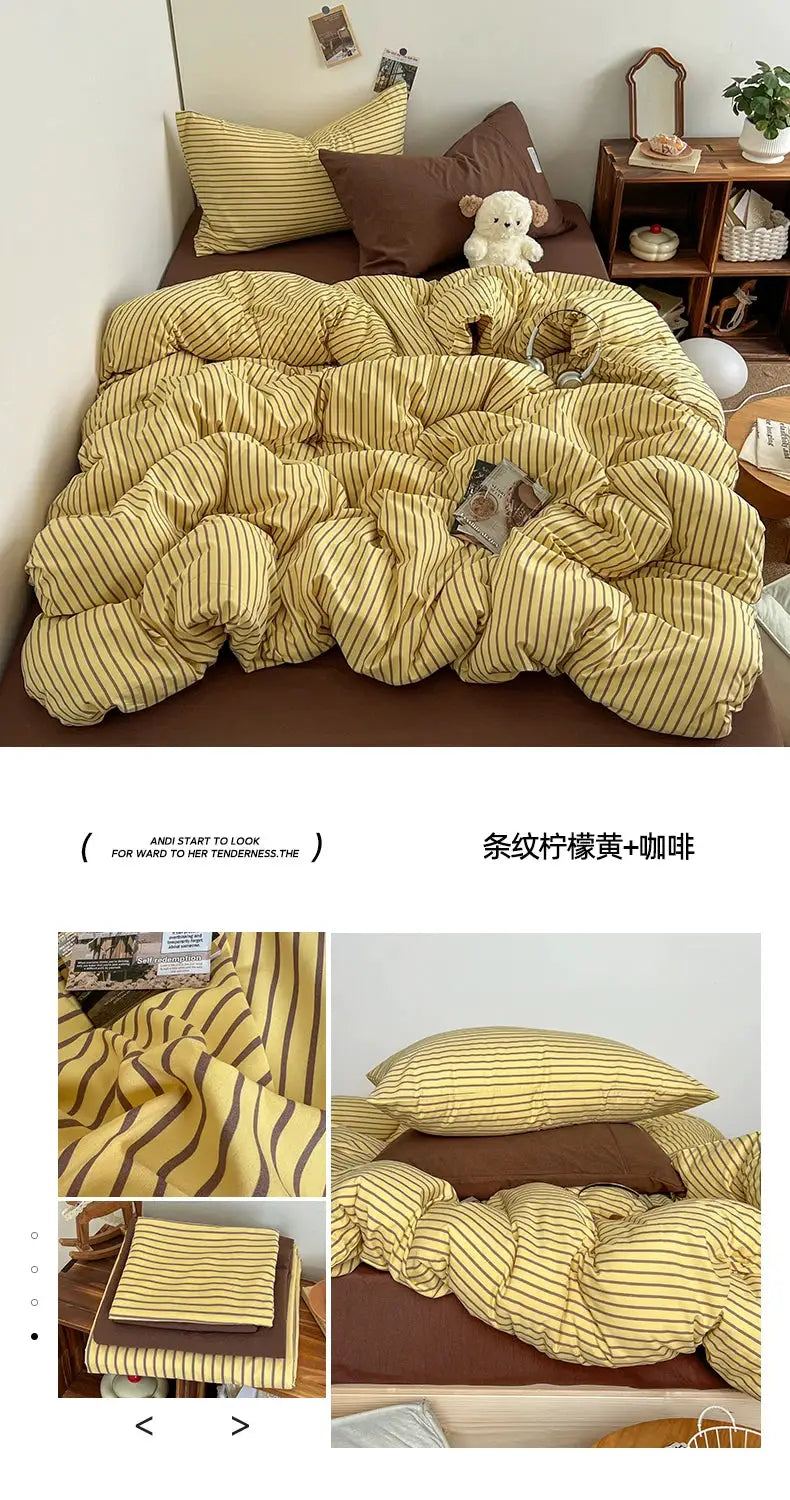 Bedding set by Simples Market featuring yellow striped duvet cover and matching pillowcases on a brown bedsheet