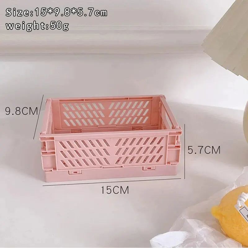 Pink plastic foldable storage basket for desktop with diagonal vent panels, 15×9.8×5.7 cm
