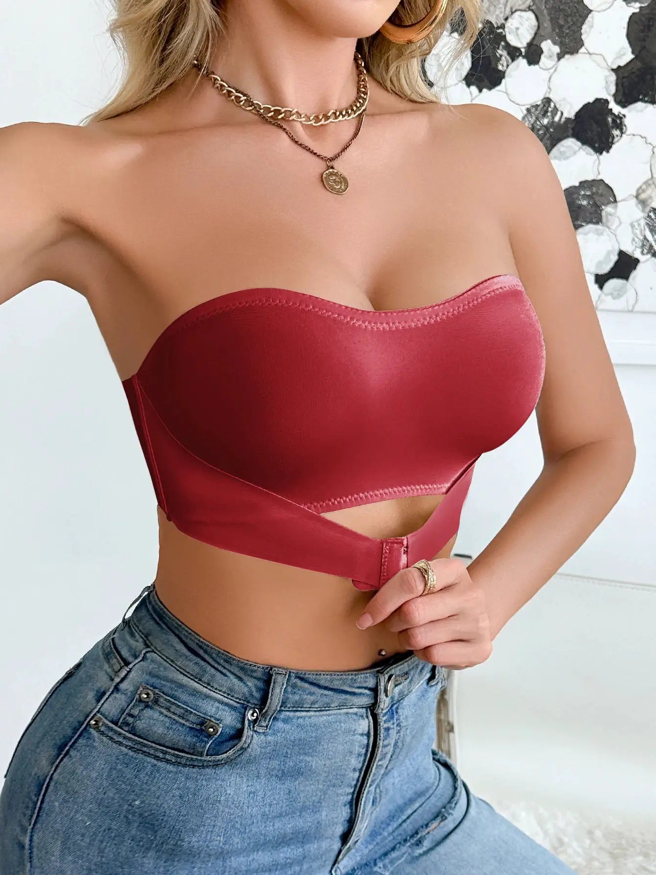 Strapless wireless red satin bralette with front clasp.