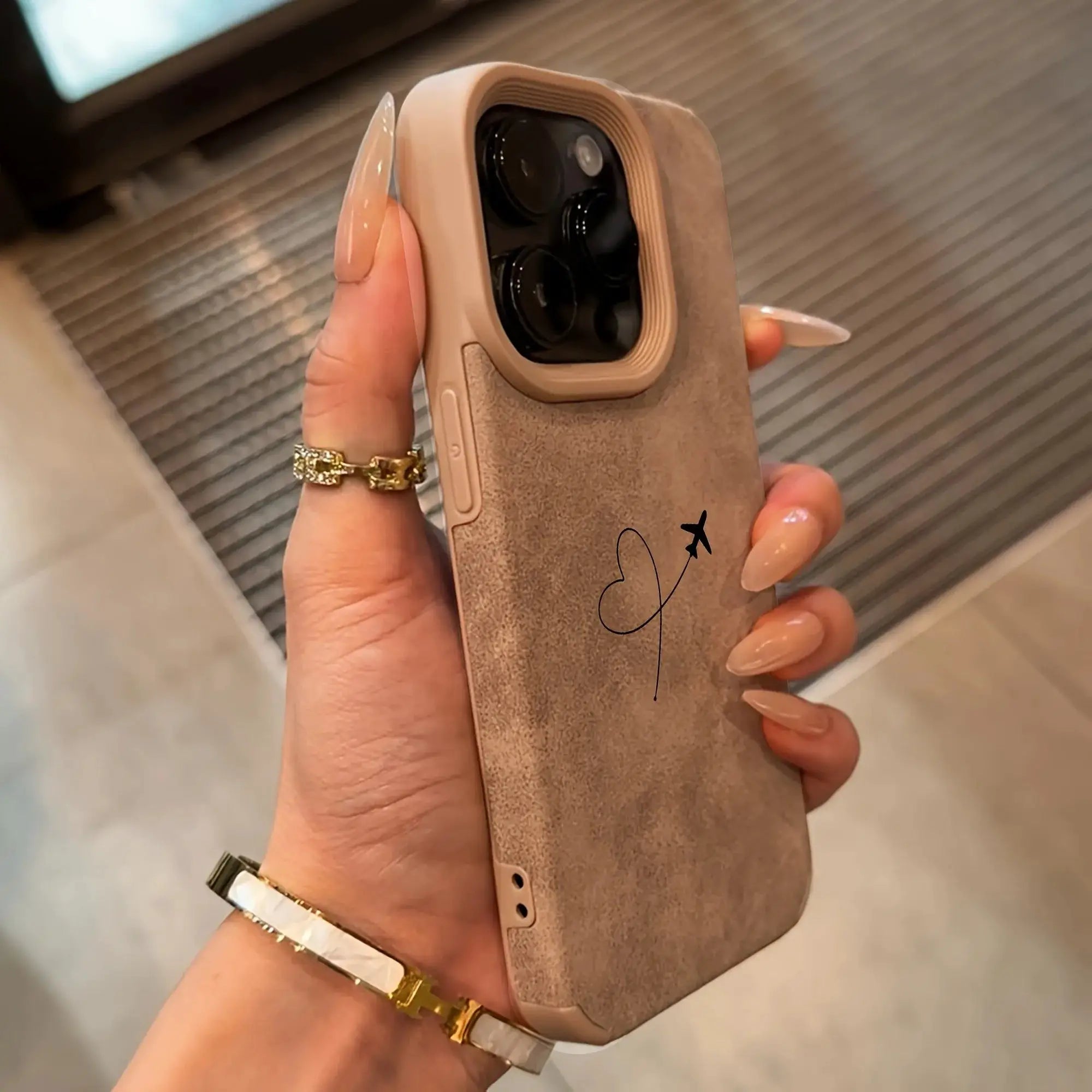 Phone case with airplane route love heart design in beige faux leather for iPhone