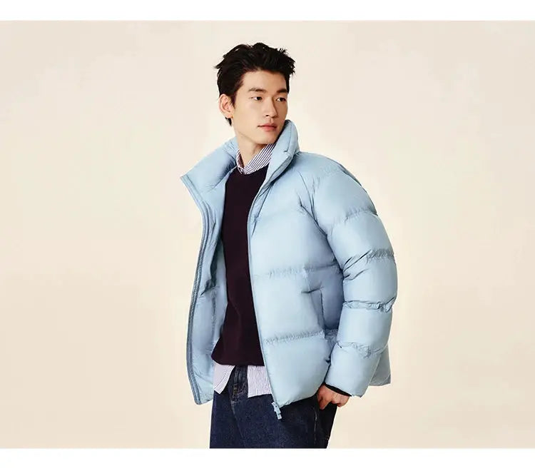 Semir light-blue down jacket, short quilted puffer coat with high collar worn by a man