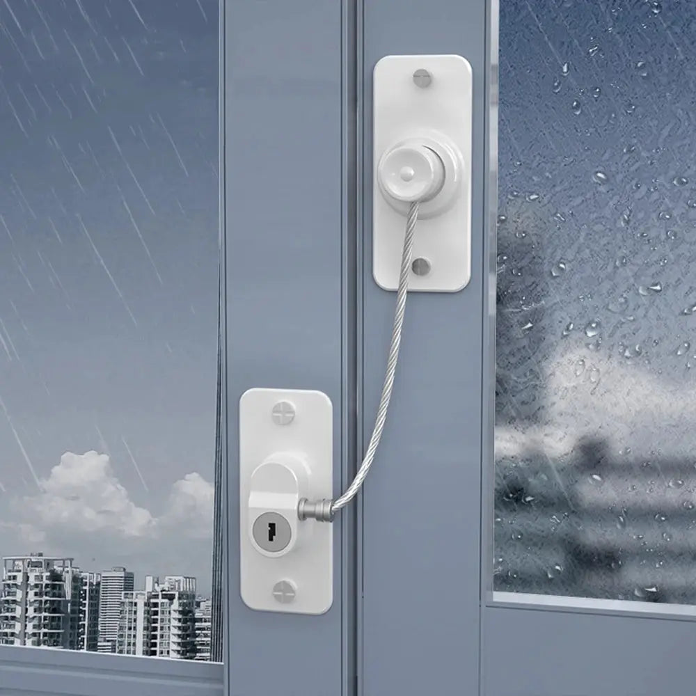 Child safety window lock set by Simples Market with white metal plates and steel cable.