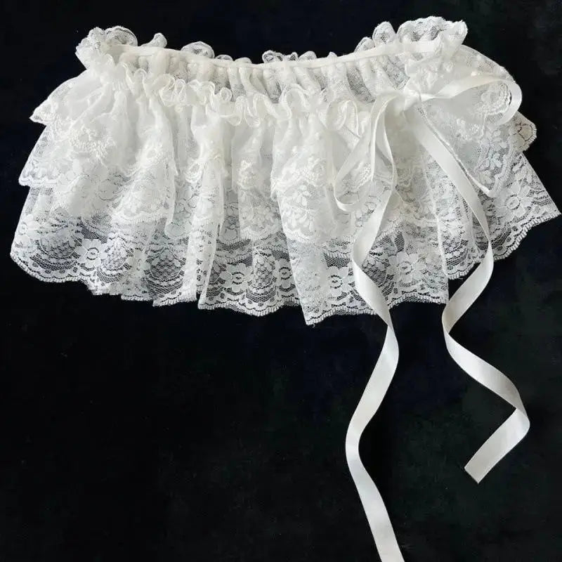 White lace layered mini skirt with ruffled waistband and satin ribbon ties, Simples Market