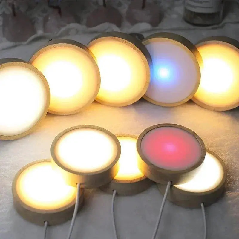 Round wooden LED night light bases; set of multiple 6/8/10 cm discs glowing warm white, blue and red