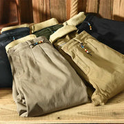 HIQOR 2025 men's cotton winter pants, loose safari style with fleece-lined waist, in khaki, army green, beige, and black.