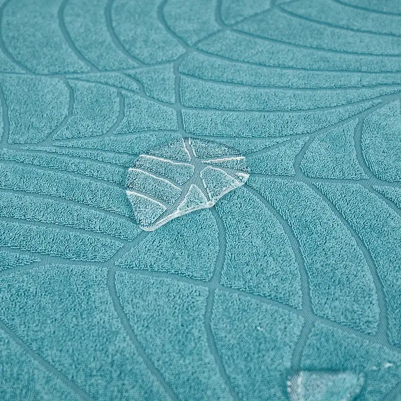 Simples Market waterproof stretch sofa cushion cover in teal with leaf-pattern texture