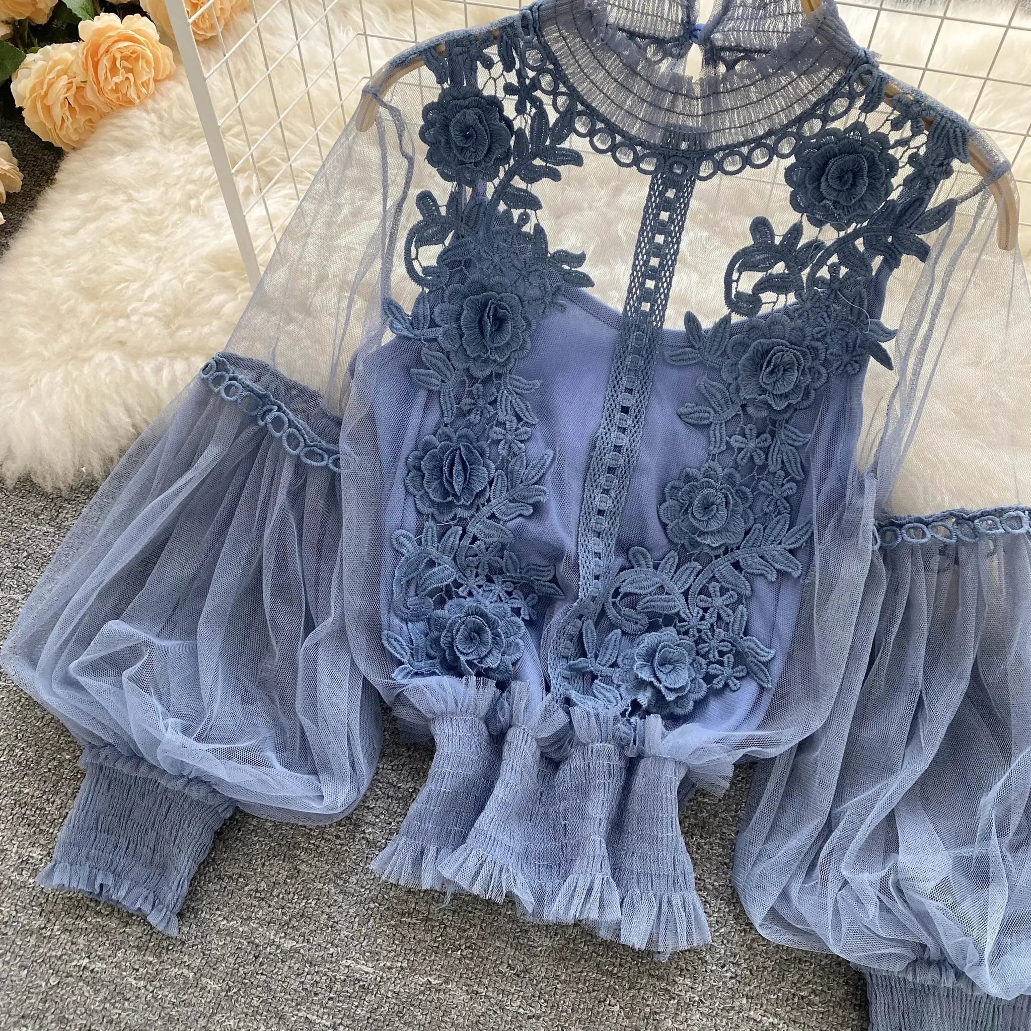 Lace puff long-sleeve blouse in blue with floral embroidery and sheer mesh overlay
