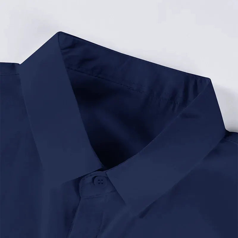Men's navy blue short-sleeve dress shirt collar close-up with smooth fabric