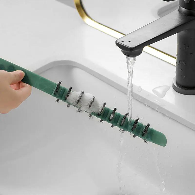 Deep-clean brush for washing machine with extra-long handle and sponge bristles, green.