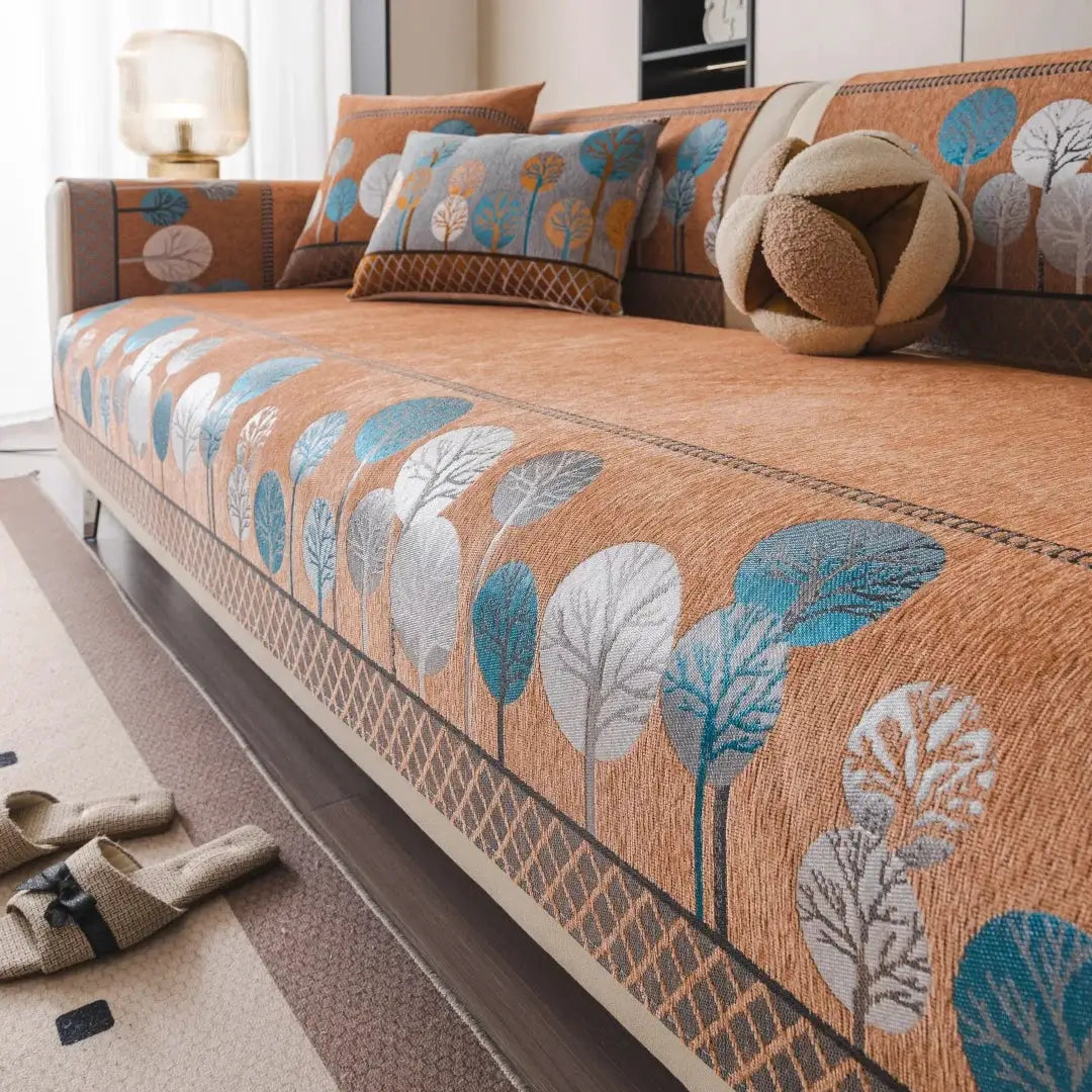 Boho full moon tree jacquard chenille sofa cover in warm orange with teal and gray leaves