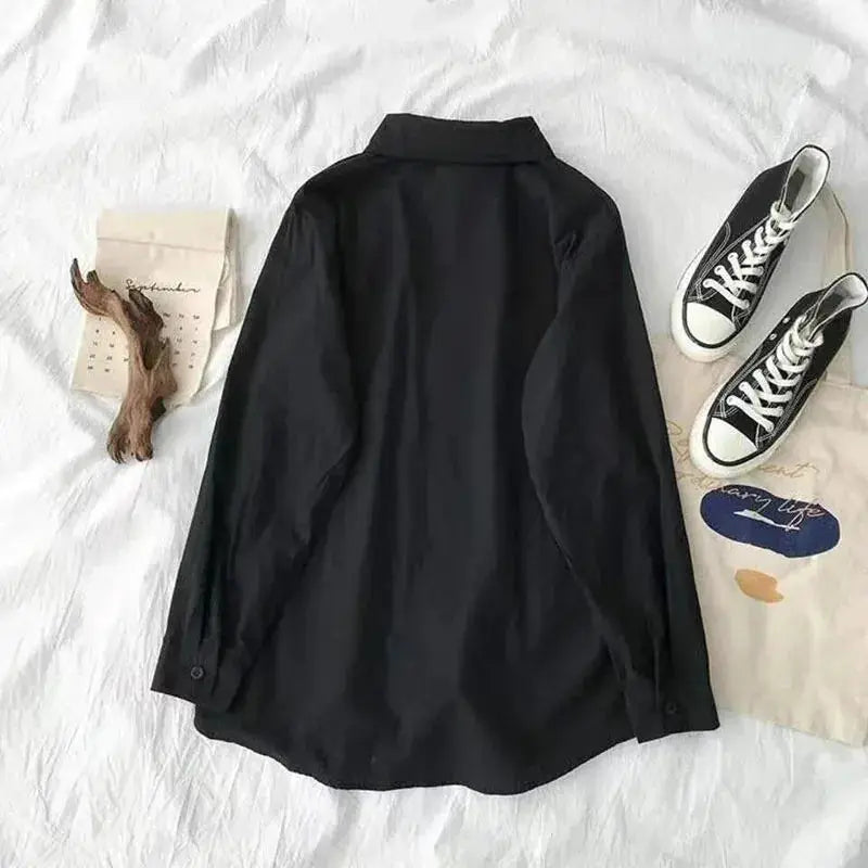 Simples Market black oversized long-sleeve shirt with turn-down collar