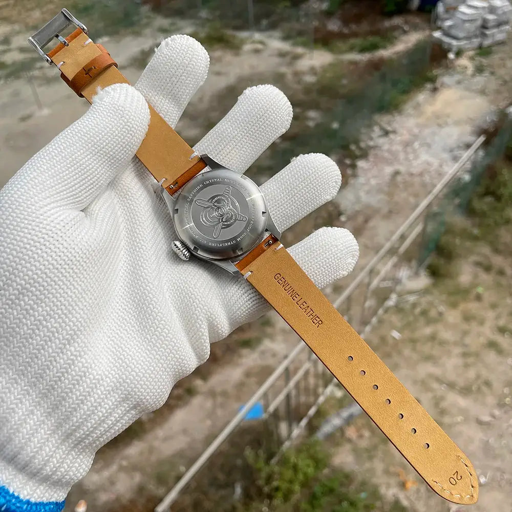 STEELFLIER SF741 wristwatch with tan leather strap and stainless steel case back, genuine leather strap visible