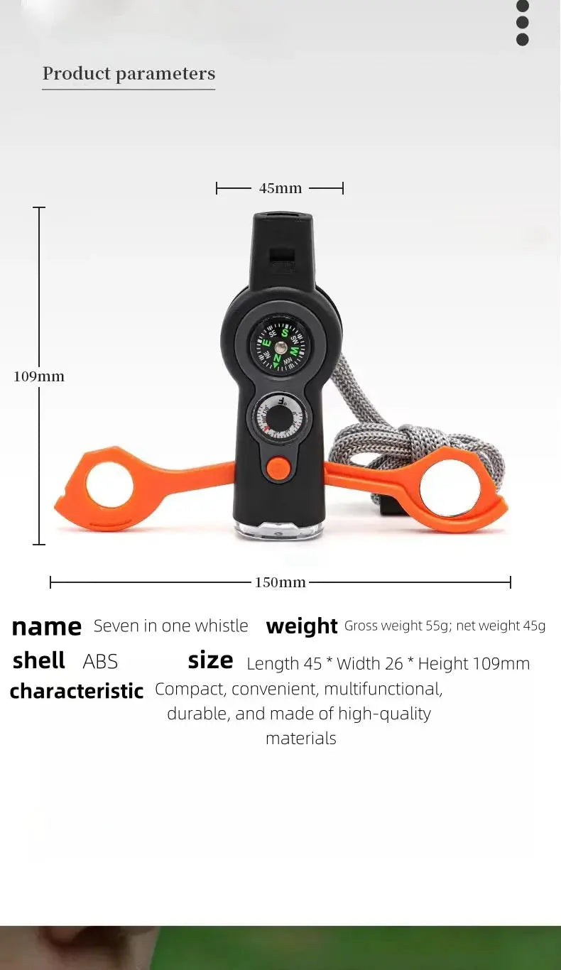 Simples Market 7-in-1 outdoor survival whistle with compass, black body, orange side arms and gray lanyard