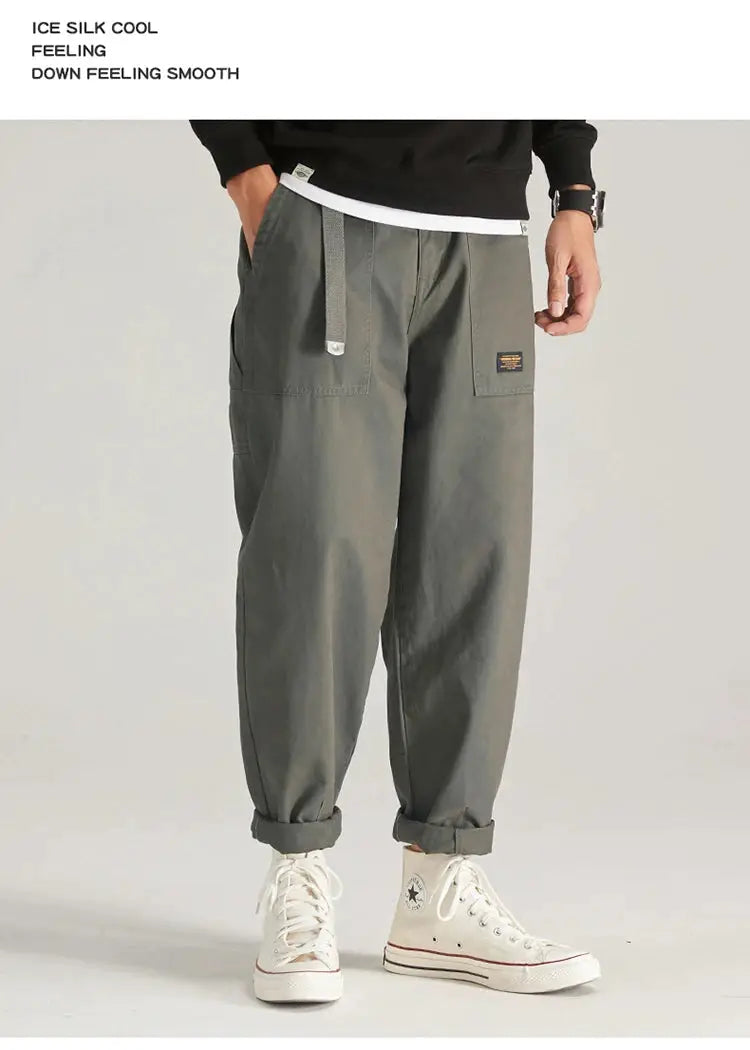 HIQOR men's cargo pants in gray olive with multiple pockets, belt design, baggy fit, and rolled cuffs