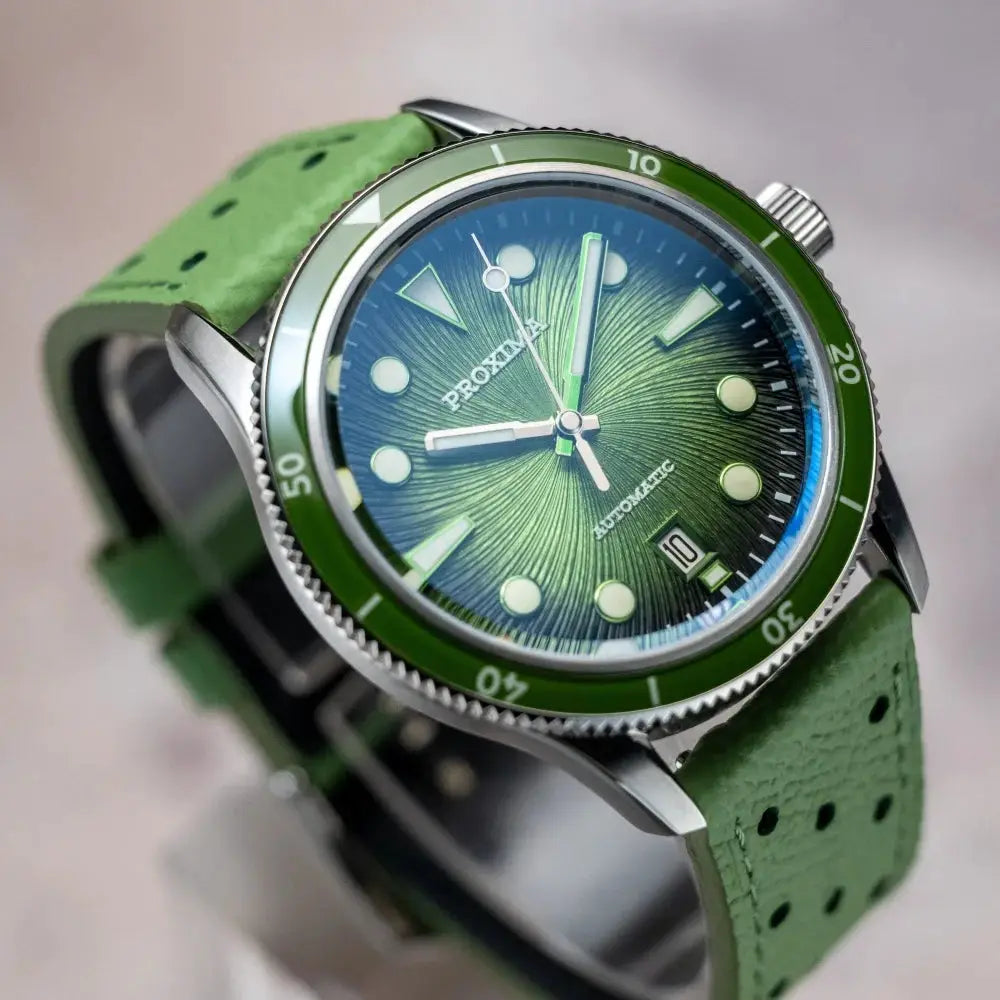 Proxima dive watch with green bezel and sunburst green dial, luminous markers, green perforated strap