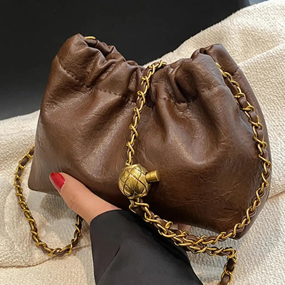 Women chain shoulder bag in brown faux leather with a gold-tone chain strap by Simples Market