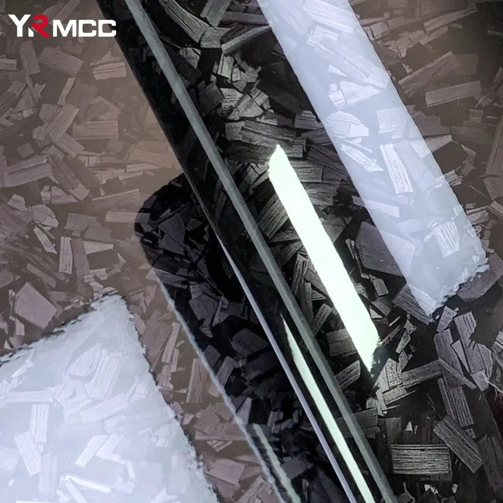 Carbon fiber gloss black car wrap vinyl film; self-adhesive with forged carbon finish and YRMC logo.