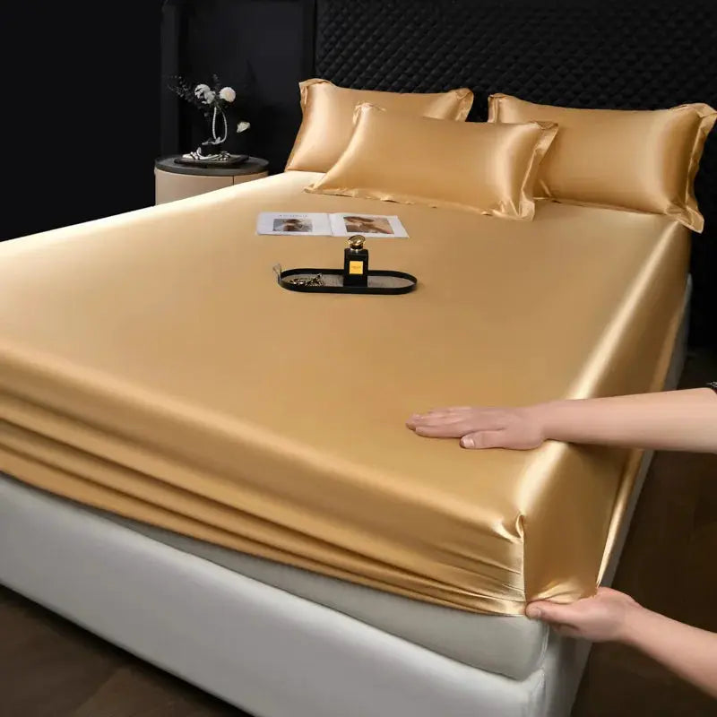 Mulberry silk 3-piece fitted sheet set by Simples Market in gold with pillowcases.