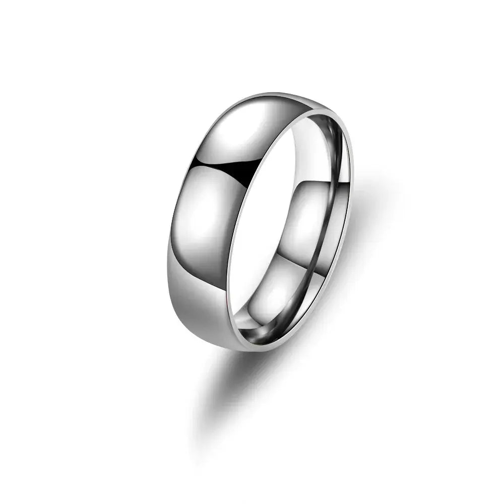 Unisex stainless steel ring for men and women with a wide, polished band