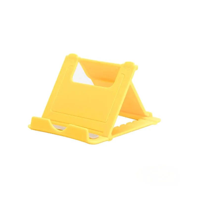 Desktop Lazy Mobile Tablet Folding Stand by Simples Market, yellow plastic, adjustable and portable