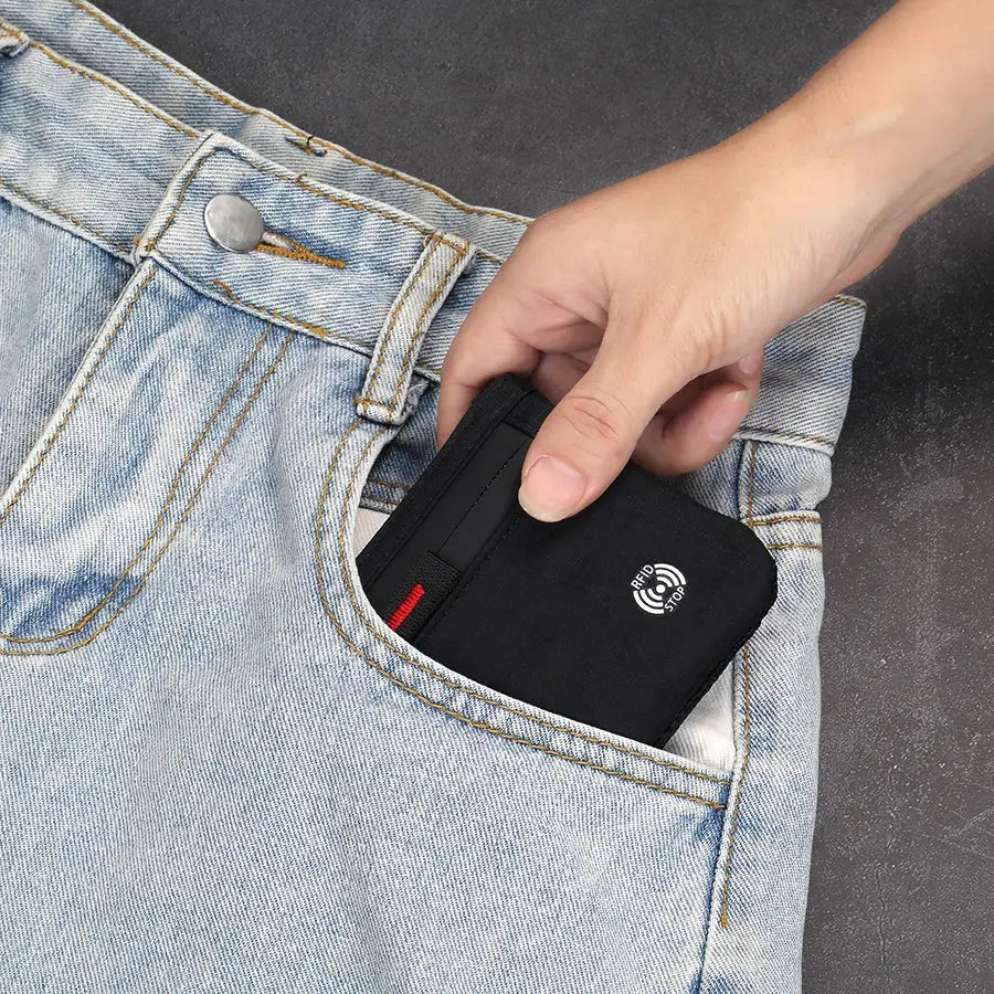 Black RFID card holder in a blue denim pocket with RFID logo