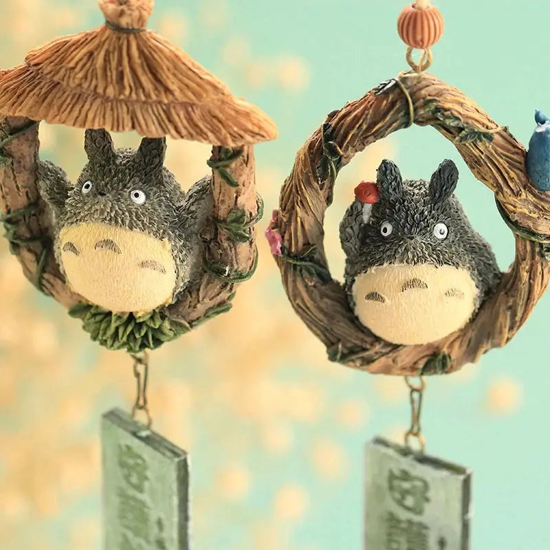 Pair of resin wind chime ornaments featuring Totoro-like creatures in vine wreaths, rustic hanging decor.