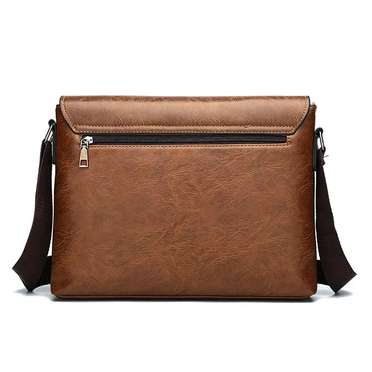 Shoulder bag by Simples Market in brown leather with front zip pocket and adjustable crossbody strap