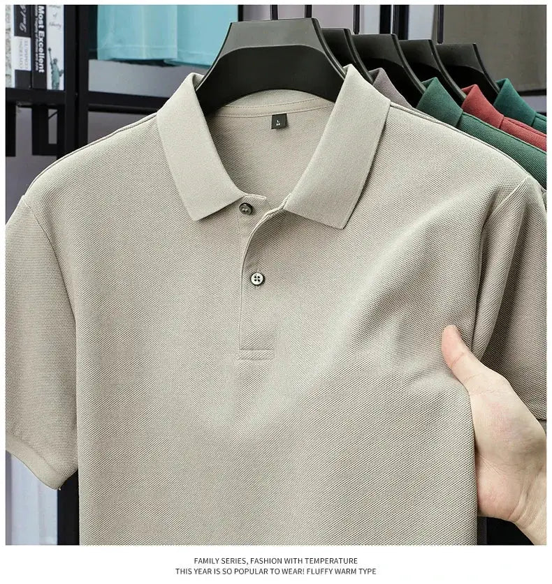 Men's 100% cotton polo shirt on a hanger in beige; five color options shown behind.