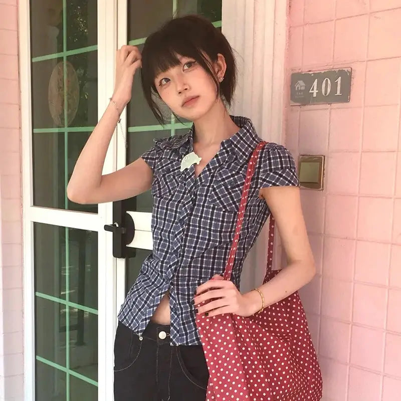 Karrram Y2k plaid shirt by Simples Market; navy check, short sleeves, V-neck, with red polka-dot tote bag